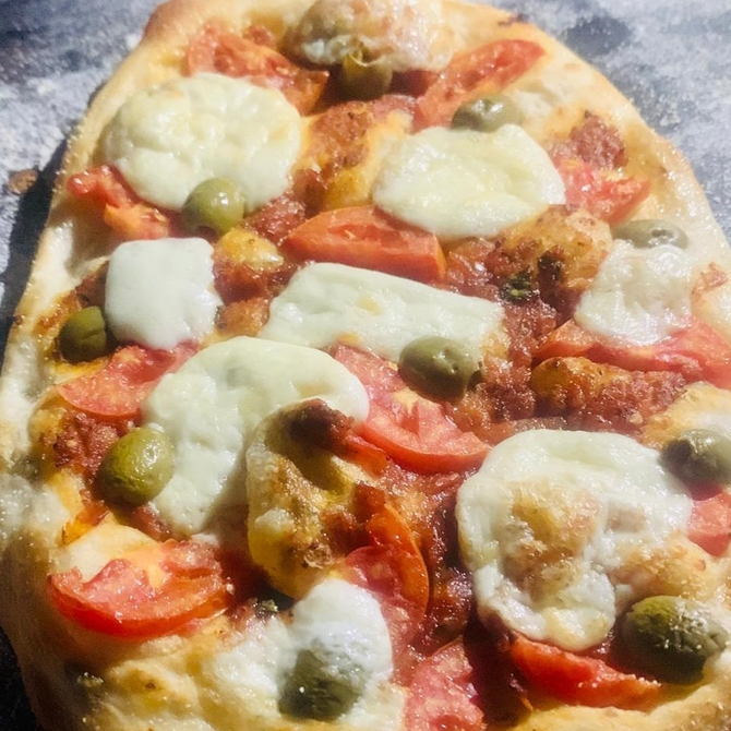 FlatBread Sourdough with Tomato olive & mozzarella